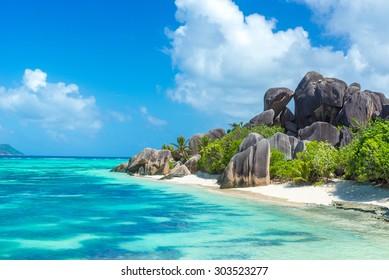 Anse Source d'Argent - granite rocks at beautiful beach on tropical island La Digue in Seychelles - Shutterstock ID 303523277