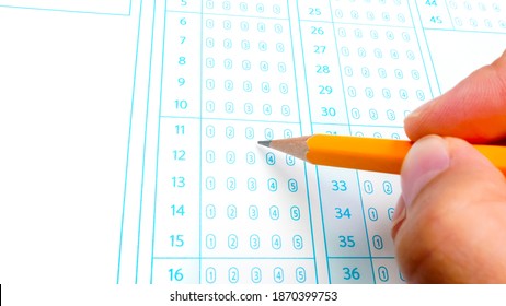 Answer sheet with pencil. Optional question method test, education system concept.