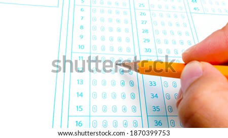 Answer sheet with pencil. Optional question method test, education system concept.