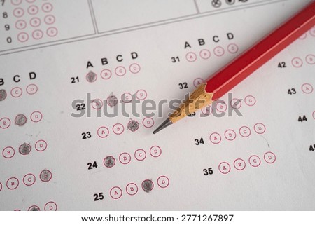 Answer sheets with pencil drawing fill to select choice, education.
