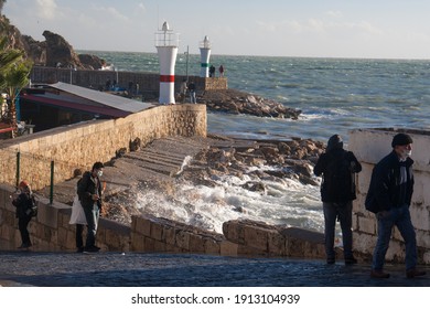 Antalya, Turkey - 01-27-2021: 
Turkish People Watch Big Waves After Winter Storm In The Port Of  Antalya