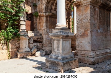 Antalya, turkey - 09. 01. 2021: Column of a famous tourist and archaeological site of Antalya is The Emperor Hadrian's gate in the old city. Travel destinations and vacation in Turkey