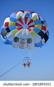 Antalya Turkey 15.10.2020: Father and Son flying with parasailing.