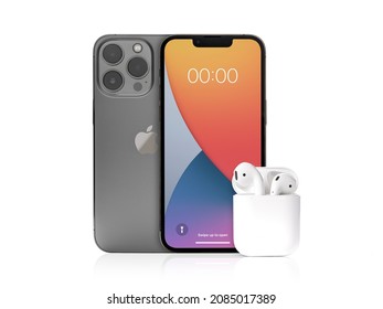 Antalya, Turkey - December 03, 2021: Front and Back view of new iPhone 13 Pro smartphone and Apple Airpods 2 earphone