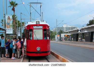 Antalya, Turkey - June 12, 2022: People Get Onboard The Nostalgic Retro Tram At Konyaalti Beach Park In Central Antalya.