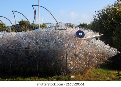Antalya, Turkey - May 21, 2022: Sculpture of a fish filled with plastic bottles. Plastic waste remains at sea at least 600 years without dissolution