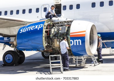 Antalya, Turkey May 28, 2017; International Antalya Airport Turkey. Aircraft mechanic repairs engine of airplane Boeing 737-800 . Airplane maintenance. Aircraft technician.
