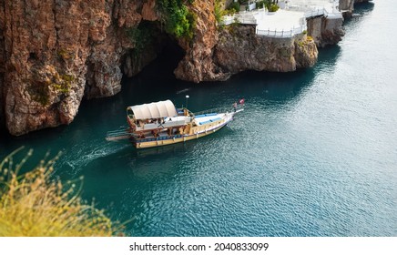 Antalya, Turkey -  September 27 2018: Leisure Boat Trip Along Coast With Sea Cave Seen From The Clifftop