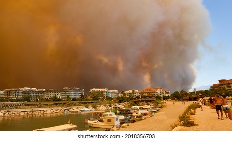 ANTALYA-MANAVGAT-SIDE, TURKEY - AUGUST 02, 2021: The Forest Fire That Started In Manavgat Threatens Settlements And Tourism Facilities.  Yellow Smoke Covered The Place Of The Blue Sky And Sea.