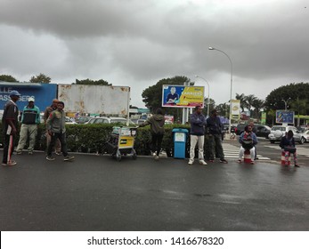 Antananarivo, Madagascar - June 03 2019 : View Of The Outdoor Pickup Of International Airport Of Antananarivo, Capital Of Madagascar, People Waiting, And Impatient Family 