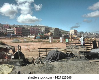 Antananarivo, Madagascar - June 10 2019:  People Selling And Buying Charcoal In The Suburb Of Antananarivo