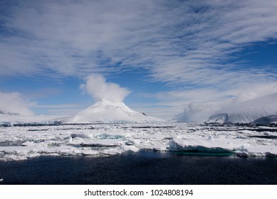 Antarctic landscape with sea and mountains - Shutterstock ID 1024808194