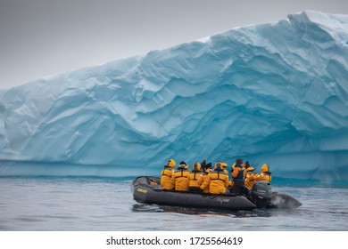 Antarctic Peninsula, Antarctica. 02.2020. People Zodiac Cruising In Antarctica With Polar Landscapes And Ice.