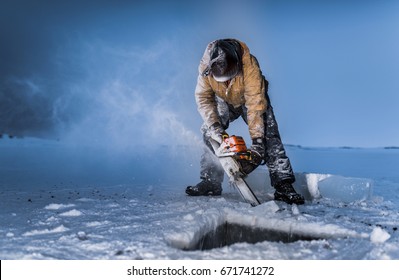 Antarctic Worker Cutting Sea Ice With Chainsaw