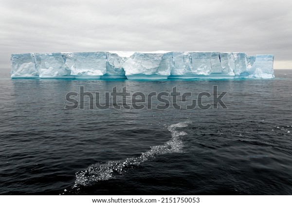 Antarctica, Antarctic Peninsula, Palmer\
Archipelago, Neumayer Channel - Global warming - Fairytale\
landscape - Tabular Iceberg in Bransfield\
Strait
