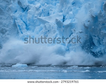 Antarctica -Close-up of a dramatic ice collapse from a polar glacier cliff, exploding water splash and ice debris, global warming theme.