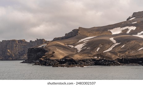 Antarctica Deception Island Rugged Cliffs Snow Patches View From Cruise Ship Ocean. Sunny Day Landscape Photography Nature Penguin Colony - Powered by Shutterstock