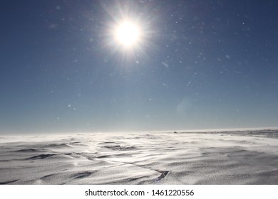 Antarctica. The Sun. Drifting Snow. Hike. Parking. 