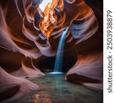 Antelope Canyon, located in northern Arizona, USA, is a stunning slot canyon renowned for its mesmerizing play of light and color. The canyon is divided into two sections.