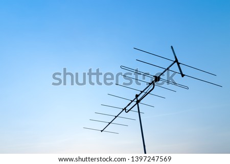 Antenna with blue sky. Close up antenna with copy space for design or text.