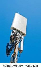 Antenna Cellular Base Station Against The Blue Sky