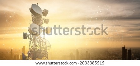 Antenna communication technology with city background. Communication tower connect to data of smart city. Telecommunication 5G. Digital Transformation IoT (Internet of Things).