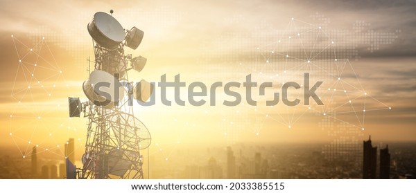 Antenna\
communication technology with city background. Communication tower\
connect to data of smart city. Telecommunication 5G. Digital\
Transformation IoT (Internet of\
Things).