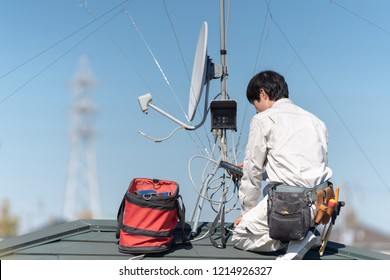 Antenna Installation Works At A Rooftop.