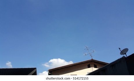 Antenna And Satallite Dish On The Rooftop With Clear Sky.