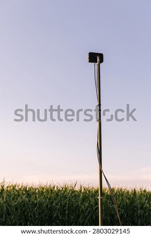 Antenna setup in a cornfield providing control for a ukrainian heavy strike hexacopter drone bomber