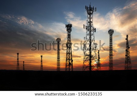 Antenna Telephone Network Communication Cable with Sunset Background
