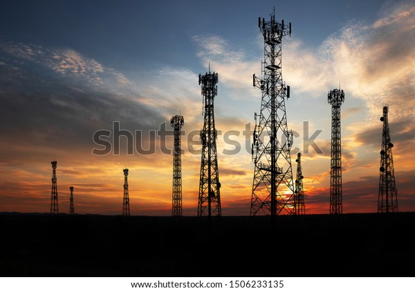 Antenna Telephone Network Communication Cable\
with Sunset Background