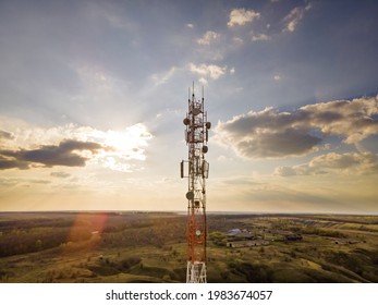 Antenna Witn 5G Technology In Rural Countryside At Sunset. Telecom Tower Witn 5G And 4G Network, Telecomunication Base Station