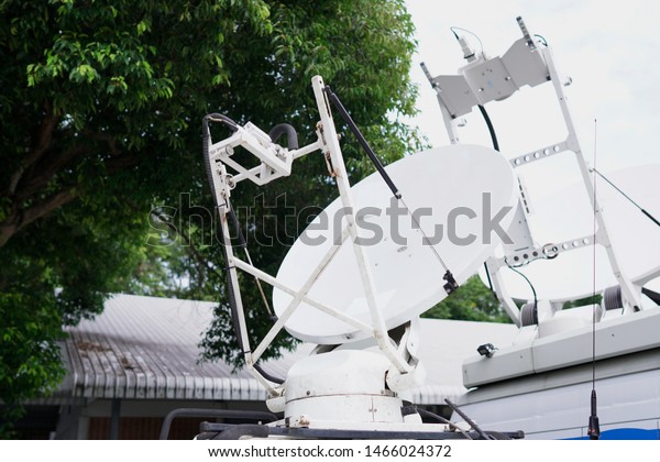 Antennas, satellite communications
systems on car roofs, mobile satellite
communications.