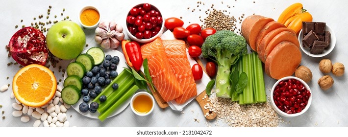 Anti Aging Foods On Light Background. Food For Healthy Heart, Brain And Good Memory. High In Antioxidants, Minerals And Vitamins. Top View, Flat Lay, Panorama