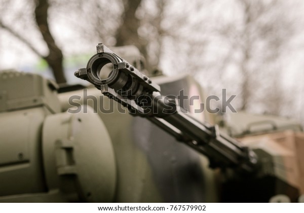 Anti\
aircraft machine gun mounted on an armored\
vehicle