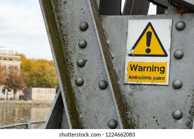 Anti Climb Paint Sign Attached To Metal Crane