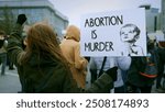 Anti murder demonstration city street. Stop abortion protest. Girl hold let baby live placard. Kill ban prohibition. Pro life banner. No roe v wade law. Angry women crowd Lot female people fight right