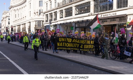 Anti Racism Protest On The Streets Of London. A Large Group Of Protestors Walking Down Regent Street. London - 19th March 2022