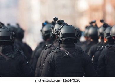anti terrorism squad with military equipment with special tactical force counter terrorism assault technology - Shutterstock ID 1266143290
