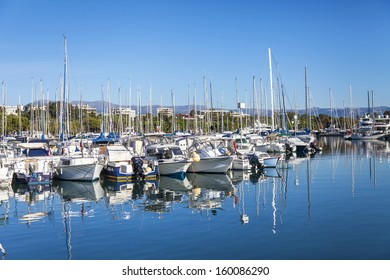 ANTIBES, FRANCE, October 12, 2013 . Yachts and their reflection in the city's port . Antibes - one of the cities of the Cote d'Azur France - Shutterstock ID 160086290