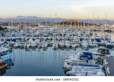 Antibes Harbour With Yachts And Fort In The Background