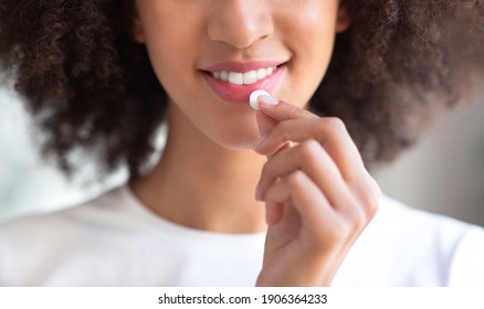 Antibiotic Or Antidepressant, Vitamins For Health Care Or Contraceptive. Cheerful Millennial African American Woman With Curly Hair Takes Pill In Morning, Cropped, Close Up, Panorama, Free Space