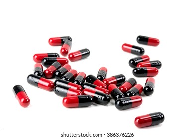 Antibiotics red and black beads in one tablet.