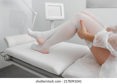 Anti-embolic Compression Hosiery For Surgery Isolated On White. Medical White Stockings, Tights For Varicose Veins And Venouse Therapy. Thrombo Embolic Deterrent Hose Or Anti-embolism Stockings.