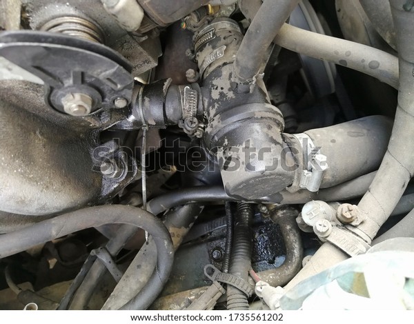Antifreeze\
leak in a car\'s internal combustion\
engine.
