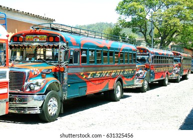 Antigua, Guatemala - April 2, 2017: Typical public transport in Guatemala called chicken buses because of colorful. Modern style boho chic.                                                         