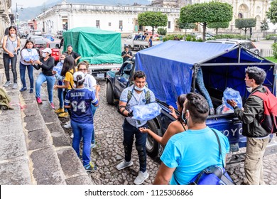 Antigua,, Guatemala -  June 5, 2018:  Volunteers load supplies outside town hall to take to area affected by eruption of Fuego (fire) volcano on June 3. 113 people died & 197 missing.