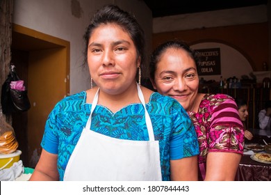 Antigua Guatemala / Guatemala - September 10, 2016: Portrait Of Women With Apron Cooking In Restaurant