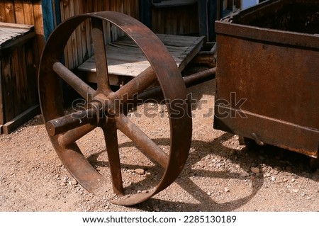 Antigue rusted Iron Wagon Wheel on iron axle